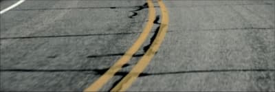 a yellow line on the side of a road