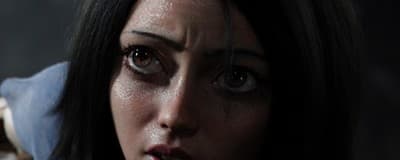 a close up of a person with a surprised look on their face