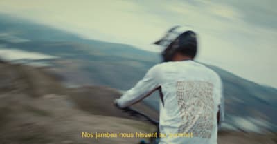 a blurry photo of a person riding a bike