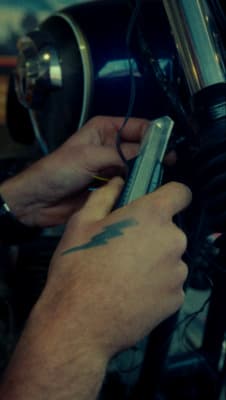 a close up of a person holding a cell phone