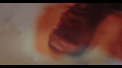 a blurry photo of a person's face