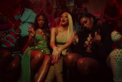 a group of women sitting next to each other