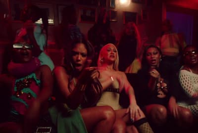 a group of women sitting next to each other