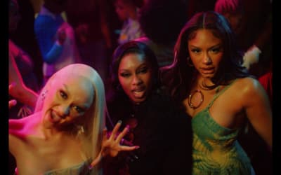 a group of women standing next to each other