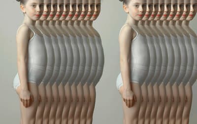 a woman is standing in front of a series of identical images