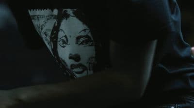 a close up of a person holding a cell phone