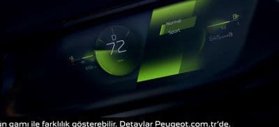 a close up of a digital clock in a car