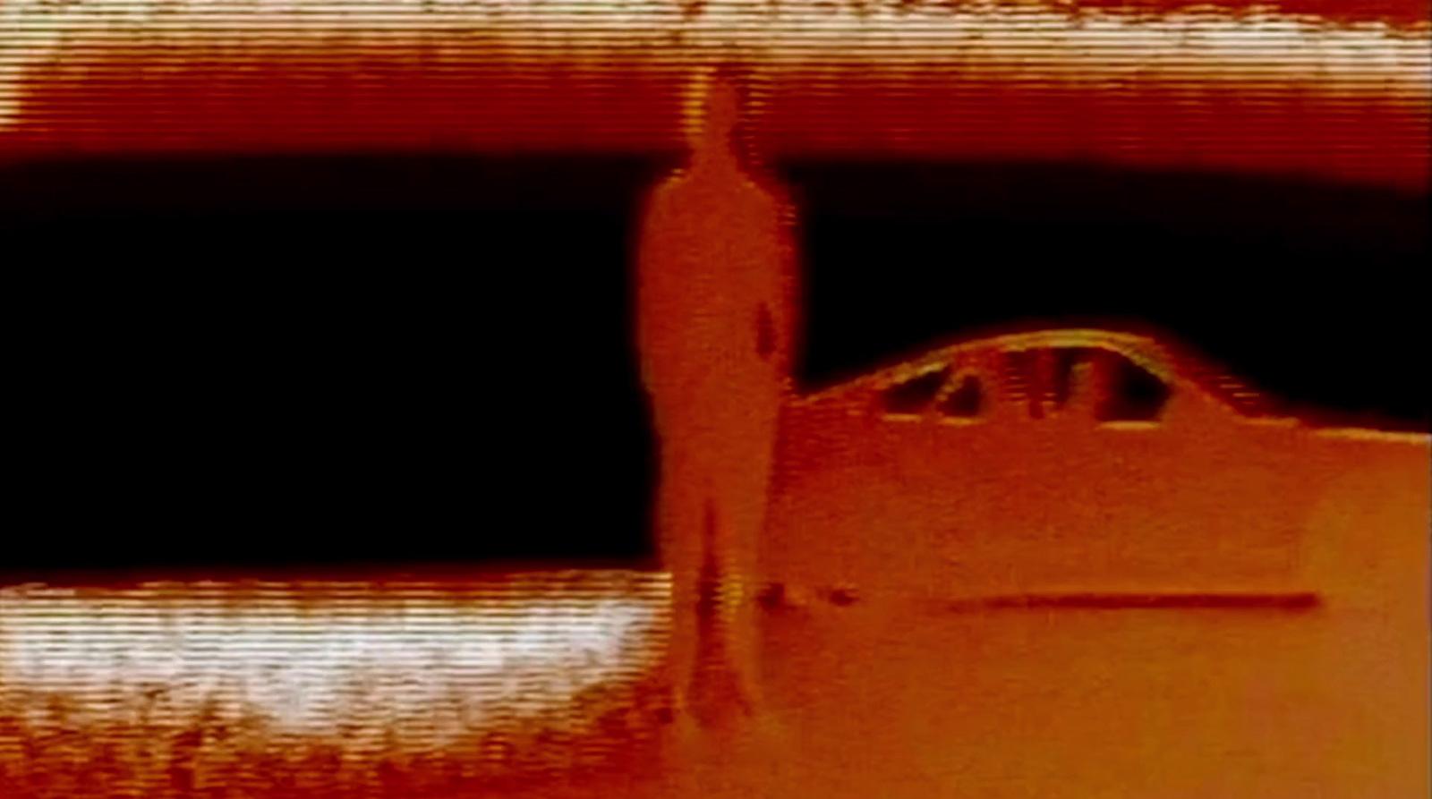 a blurry photo of a bottle of wine