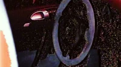 a close up of a steering wheel on a car
