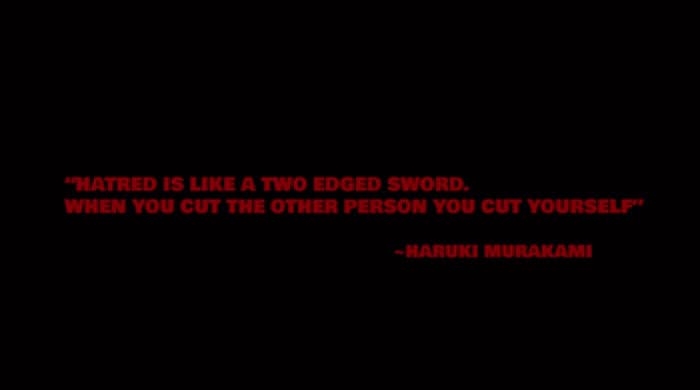 a black background with a red quote on it