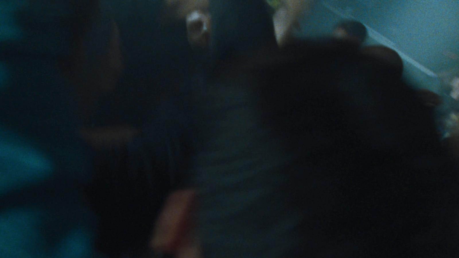 a blurry photo of a group of people in a room