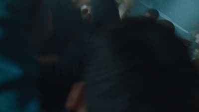 a blurry photo of a group of people in a room