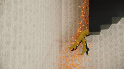 a bunch of orange balls falling down a stair case