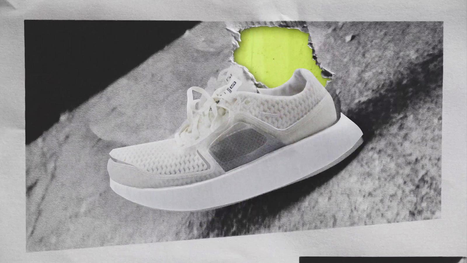 a picture of a white shoe with a hole in the side