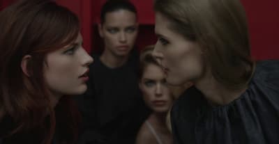 a group of people standing next to each other