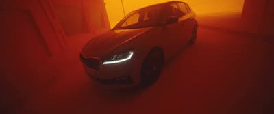 a car parked in a dimly lit room