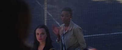a couple of women standing next to each other
