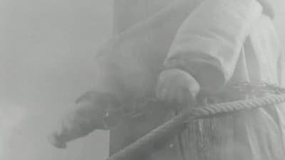 a black and white photo of a statue of liberty