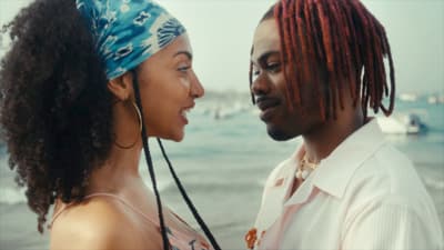a man and a woman standing next to each other