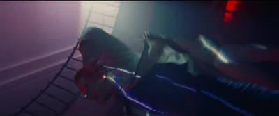 a blurry photo of a person sitting on a chair
