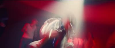 a blurry photo of a person on a stage