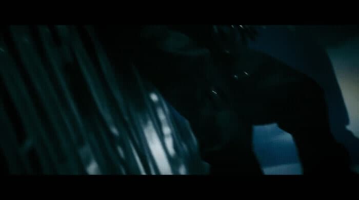 a blurry image of a person in a dark room