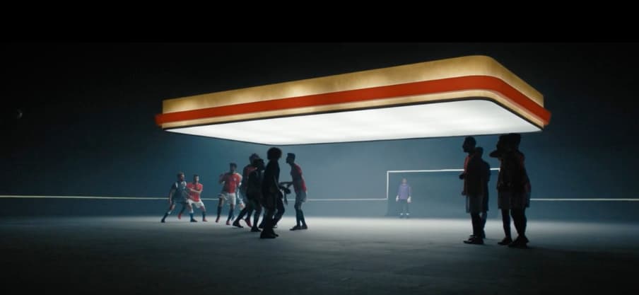 a group of people standing around a gas station