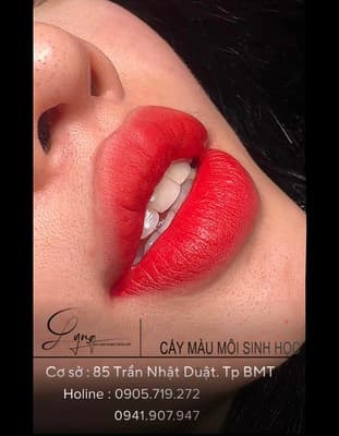 a close up of a person with red lipstick
