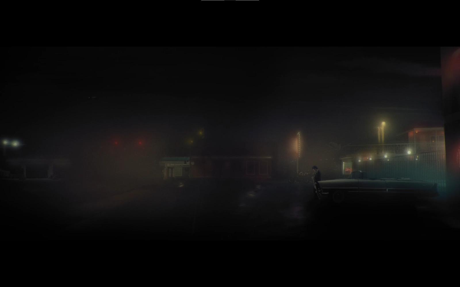 a blurry photo of a person standing in the dark