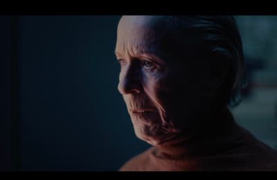an older man with a serious look on his face