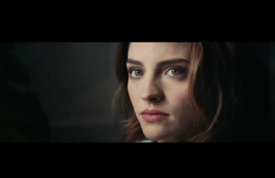 a close up of a person with blue eyes