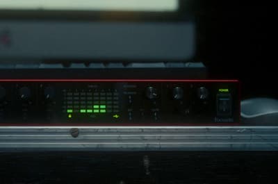 a close up of a sound board on a table