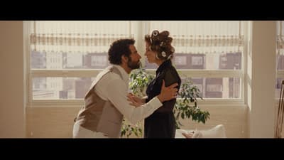 a man and a woman standing next to each other