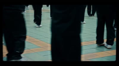a group of people standing next to each other