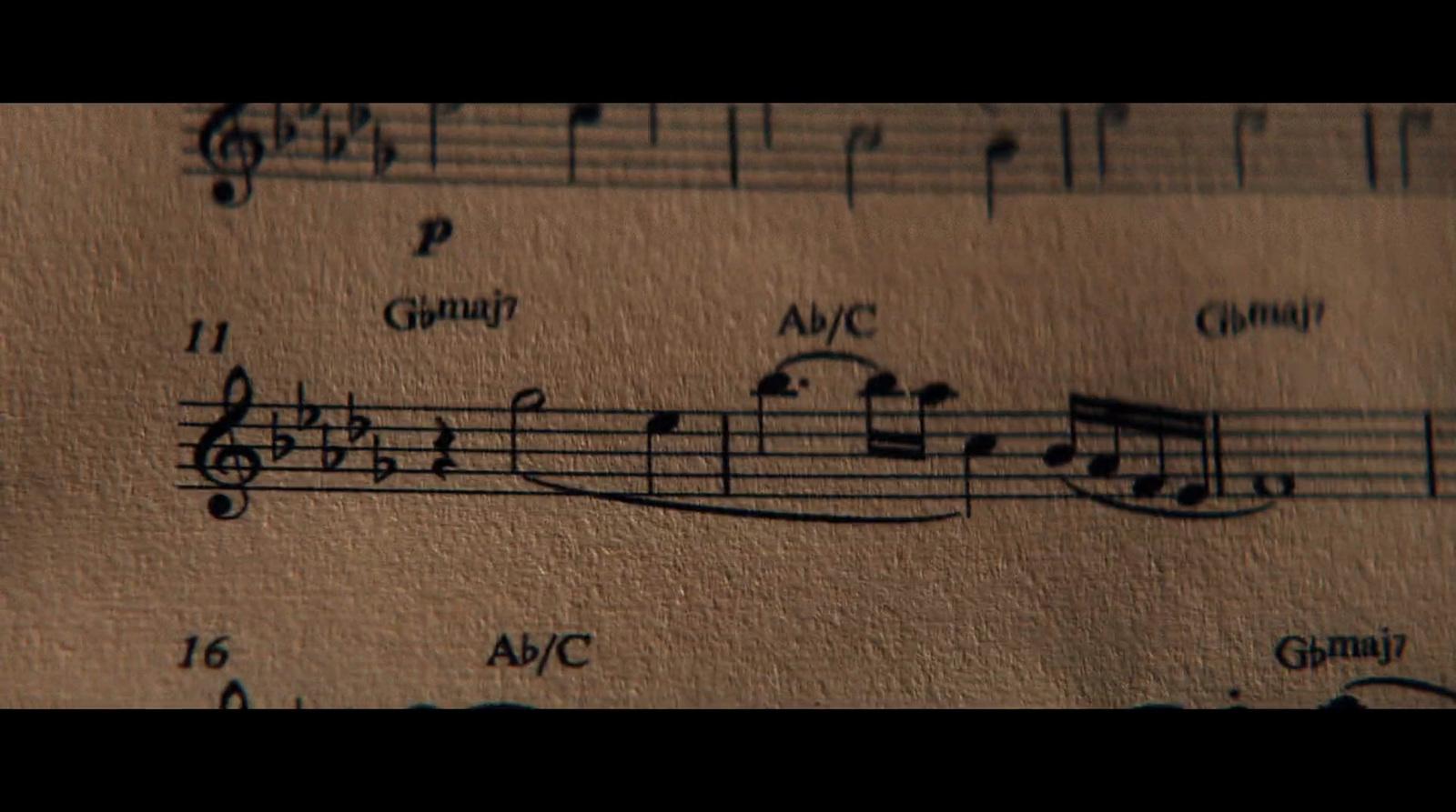 a sheet of music with musical notes on it