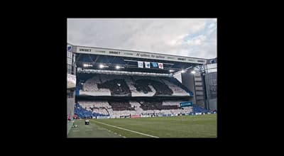 a stadium with a large number on the side of it