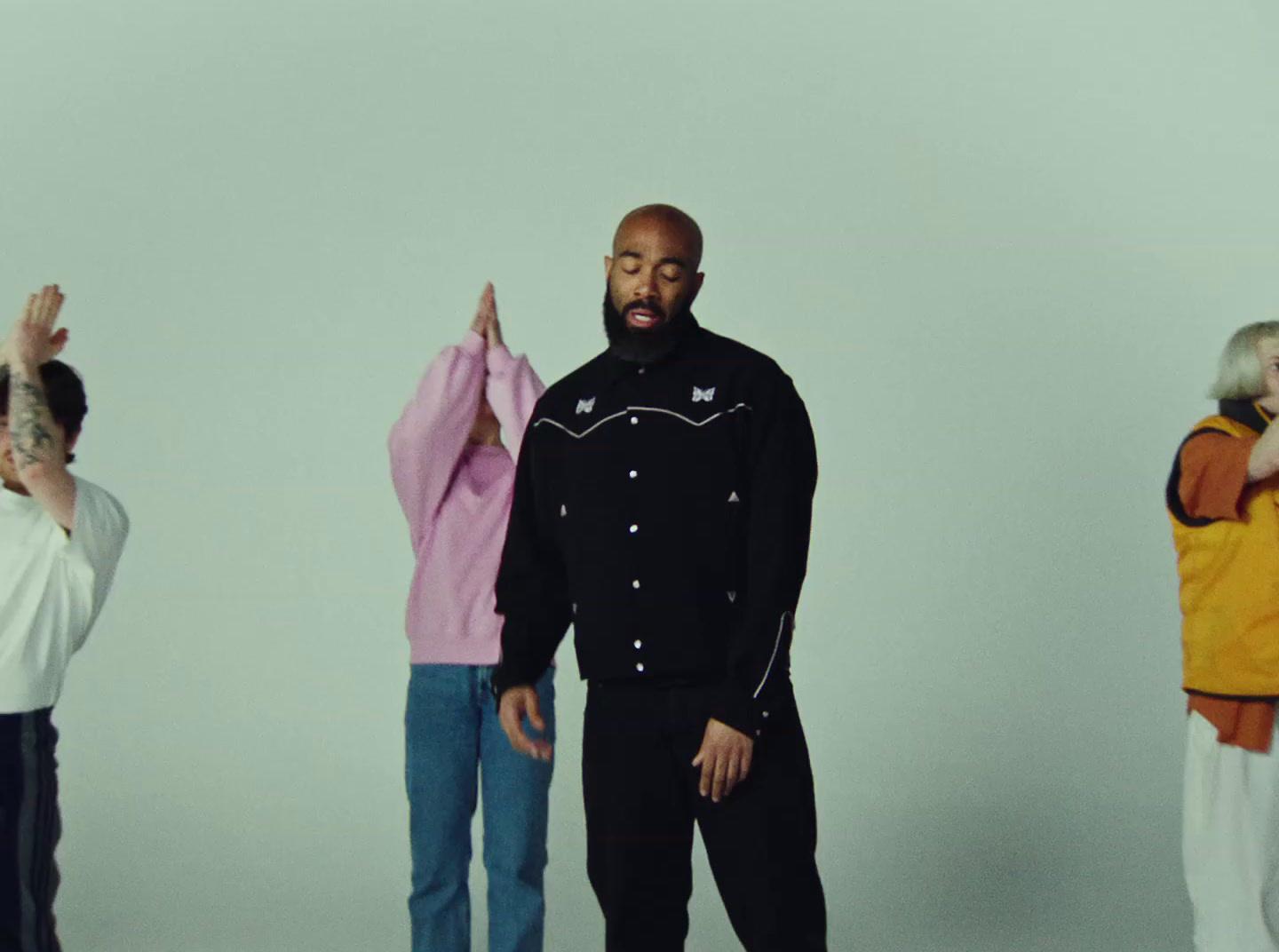a group of people standing next to each other