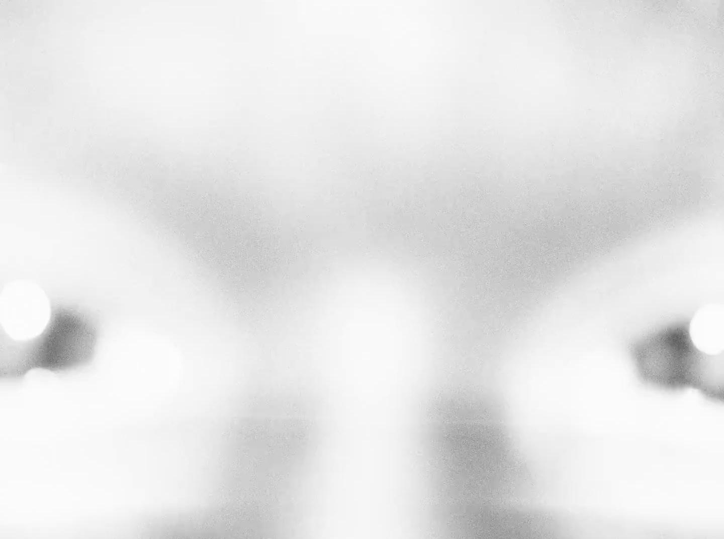 a blurry photo of a person's face
