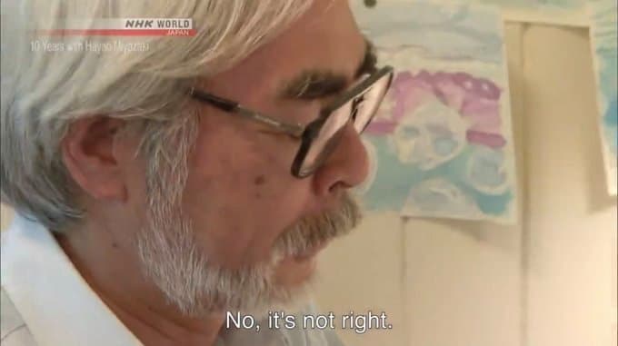 a man with a white beard and glasses
