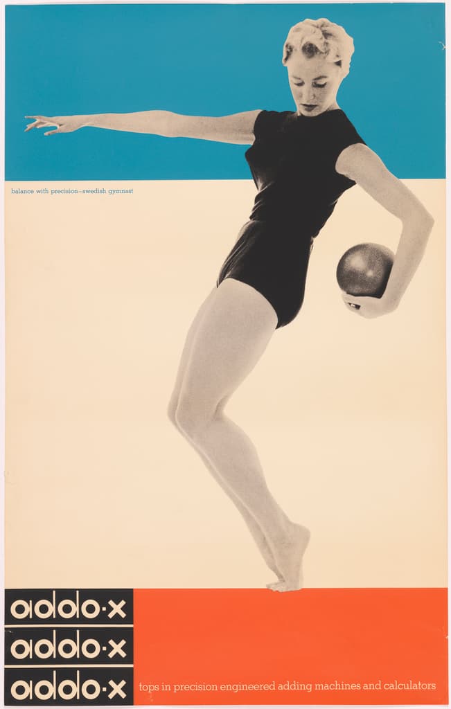a woman in a black leotard holding a ball