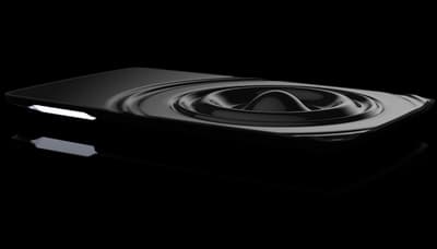 a black speaker on a black background