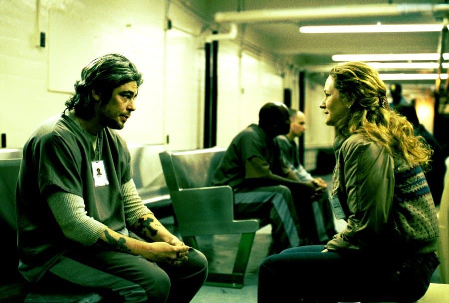 a man and a woman sitting next to each other