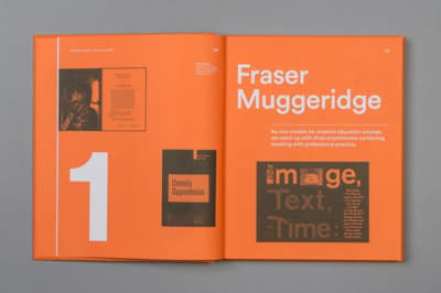 an orange book with black and white images