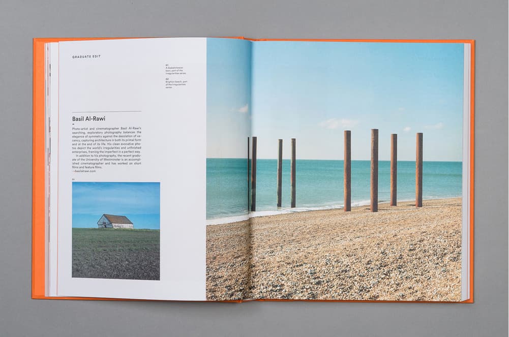 an open book with a picture of a house on the beach