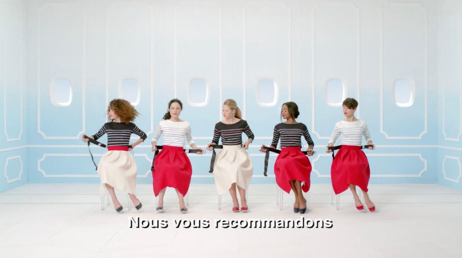 a group of women standing next to each other