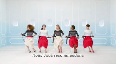 a group of women standing next to each other