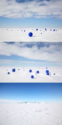 a series of three photographs of blue balls in the snow