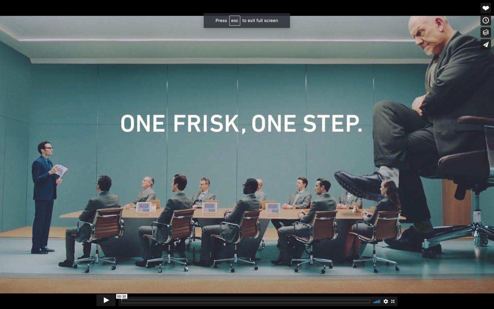 a group of people sitting around a conference table