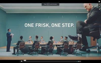 a group of people sitting around a conference table