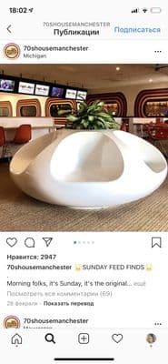 a large white bowl sitting on top of a table
